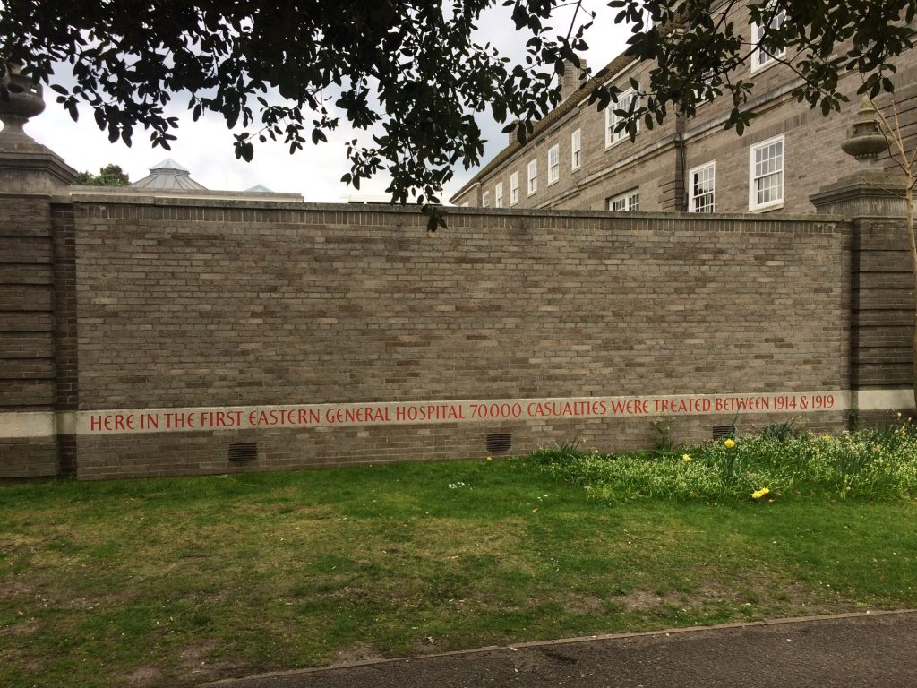Inscription carved on wall of Clare Court commemorating the First Eastern General Hospital